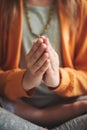 Close up of hands of a young girl meditating AI generated