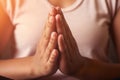 Close up of hands of a young girl meditating AI generated