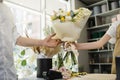 Floristics and making bouquets in a flower shop. Royalty Free Stock Photo
