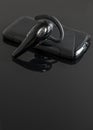 Close-up of handsfree bluetooth device. Royalty Free Stock Photo