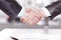 Close up. handshake business partners after signing the contract. Royalty Free Stock Photo