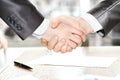 Close up. handshake business partners after signing the contract. Royalty Free Stock Photo