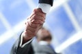 Close up.handshake of business people on a light background. Royalty Free Stock Photo