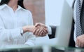 Close-up of handshake businessman and business woman. Royalty Free Stock Photo