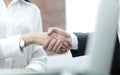 Close-up of handshake businessman and business woman. Royalty Free Stock Photo