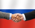 Close up of handshake over russian flag