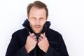 Close up handsome man keeping warm with jacket Royalty Free Stock Photo