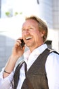 Close up handsome man talking on cell phone in city Royalty Free Stock Photo