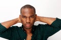 Close up handsome young african american man with serious expression against isolated white background Royalty Free Stock Photo