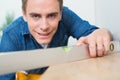 Close up of a handyman using a spirit level Royalty Free Stock Photo