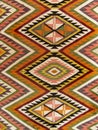 Close up of a hanged colourful handmade traditional wool rug Royalty Free Stock Photo