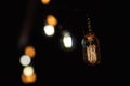 Close up hanging light bulbs - retro style. Royalty Free Stock Photo