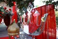 Close up of hanging mirror crown pattern while filling up red color curtains on a backyard or lawn for wedding or reception