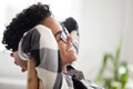 Close up of happy black female relax in chair smiling Royalty Free Stock Photo