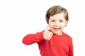 Close up happy boy on white background thumb up hand sign