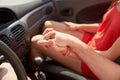 Close up of happy couple driving in cabriolet car Royalty Free Stock Photo