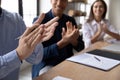 Close up happy diverse business people clapping hands. Royalty Free Stock Photo