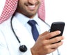 Close up of a happy doctor hand using a smart phone Royalty Free Stock Photo