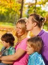 Close-up of happy family sitting together in hug Royalty Free Stock Photo