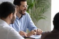 Close up happy laughing businessman have free time in boardroom. Royalty Free Stock Photo