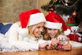 Close-up of happy little girl playing with snow ball toy while l Royalty Free Stock Photo