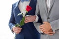 Close up of happy male gay couple holding hands Royalty Free Stock Photo