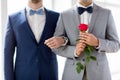 Close up of happy male gay couple holding hands Royalty Free Stock Photo