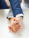 Close up of happy male gay couple holding hands Royalty Free Stock Photo