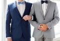 Close up of happy male gay couple holding hands Royalty Free Stock Photo