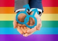 Close up of happy male gay couple with love symbol Royalty Free Stock Photo