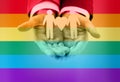 Close up of happy male gay couple with love symbol Royalty Free Stock Photo