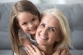 Portrait of happy grandma and lovely granddaughter Royalty Free Stock Photo