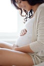 Close up of happy pregnant woman in bed at home Royalty Free Stock Photo