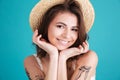 Close up of a happy smiling woman in straw hat Royalty Free Stock Photo