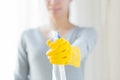 Close up of happy woman with cleanser spraying Royalty Free Stock Photo