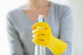 Close up of happy woman with cleanser spraying Royalty Free Stock Photo