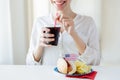Close up of happy woman drinking coca cola Royalty Free Stock Photo