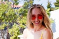 Close Up Happy Woman Face Summer Holidays. Summertime Smile Girl with Blond Hair at summer vacation in swim suit. Selective focus Royalty Free Stock Photo