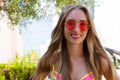 Close Up Happy Woman Face Summer Holidays. Summertime Smile Girl with Blond Hair at summer vacation in swim suit. Selective focus Royalty Free Stock Photo