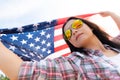 Close up happy woman holding United States of America flagu Royalty Free Stock Photo