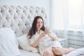 happy woman reading correspondence on her smartphone. Royalty Free Stock Photo