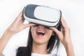 Close-up of happy Women using VR-headset glasses of virtual reality on isolated white background, Royalty Free Stock Photo
