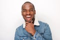 Close up happy young african american guy laughing with denim jacket Royalty Free Stock Photo