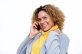 Close up happy young african american woman talking with mobile phone on isolated white background Royalty Free Stock Photo