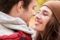 Close up of happy young couple kissing outdoors Royalty Free Stock Photo