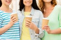 Close up of happy young women drinking coffee Royalty Free Stock Photo