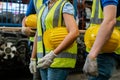 Close up hardhats or helmets of team engineering, worker standing at industrial.