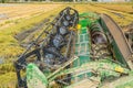 Close up harvesting with a machine rice field at the Ebro Delta in Spain