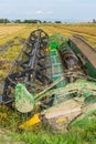 Close up harvesting with a machine rice field at the Ebro Delta in Spain