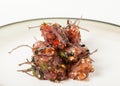 Plate of Hawaiian Poke Raw Fish Prepared with Onions and Seaweed Royalty Free Stock Photo